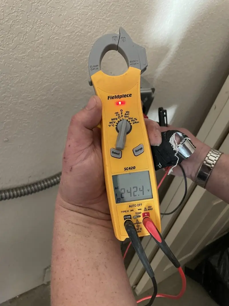 Voltage testing with clamp meter during Generator Installation in Webb City